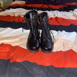 Black leather combat boots. Super cute in the winter